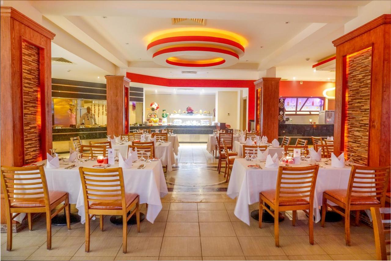 Hotel Charmillion Club Aquapark Šarm aš-Šajch Exteriér fotografie The interior of the restaurant